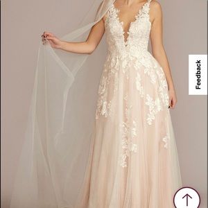 Illusion Plunge V-Neck Lace Wedding Gown
OLEG CASSINI
CWG924